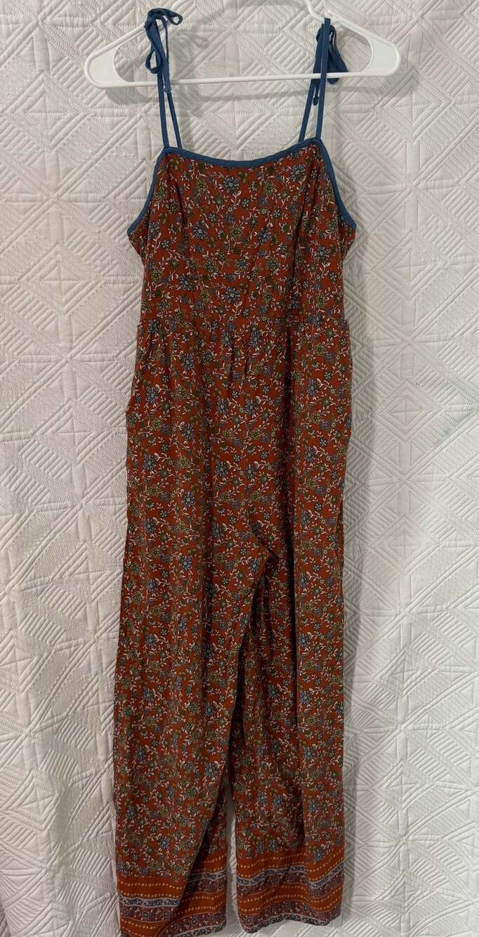 Live To Be Spoiled Floral Print Wide Leg Jumpsuit fits like size 8